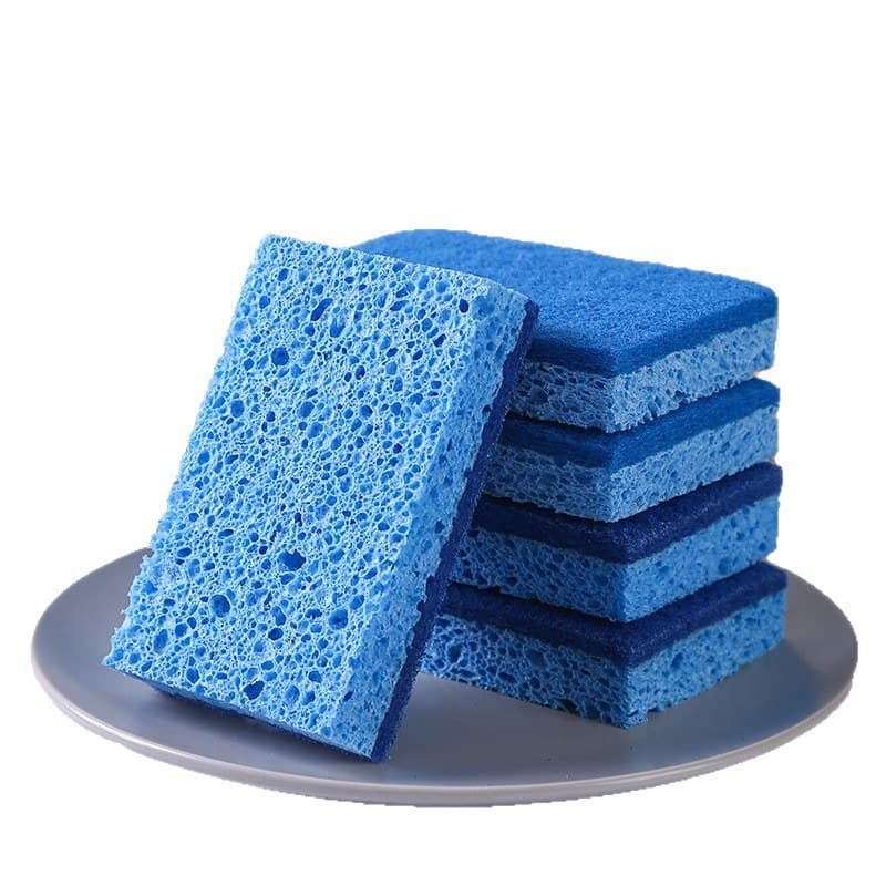 Cellulose sponge pads stacked on a plate for cleaning product sourcing